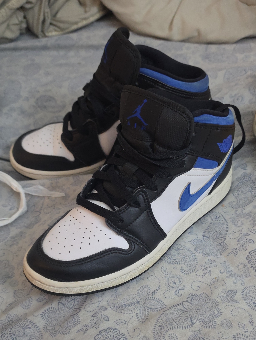 Jordan Men’s High-Top Sneakers in Black White and Blue